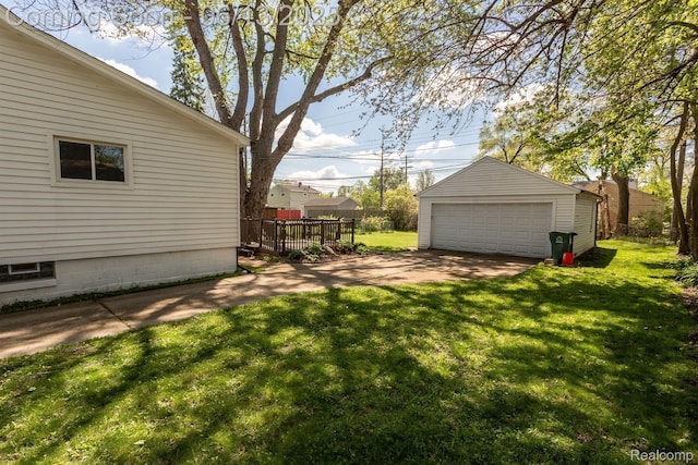 1904 Academy St, Ferndale, MI 48220 - view of green lawn featuring a detached garage, an outdoor structure, and a deck