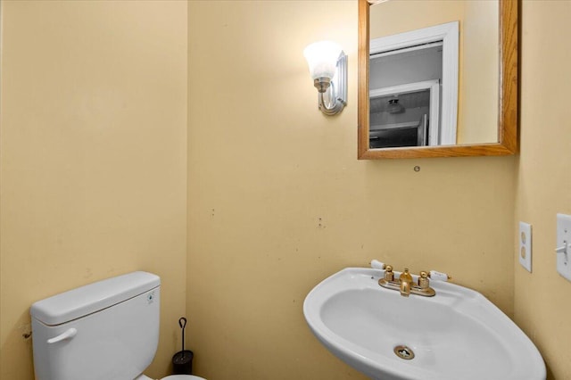 2144 Stanford Dr SE, Kentwood, MI 49508 - bathroom featuring a sink and toilet