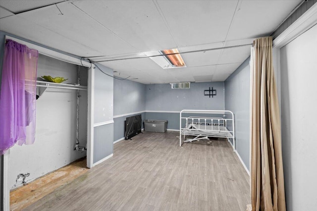 2144 Stanford Dr SE, Kentwood, MI 49508 - finished basement featuring wood finished floors and baseboards