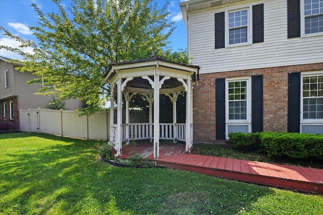 2144 Stanford Dr SE, Kentwood, MI 49508 - view of front of house featuring brick siding and a gazebo