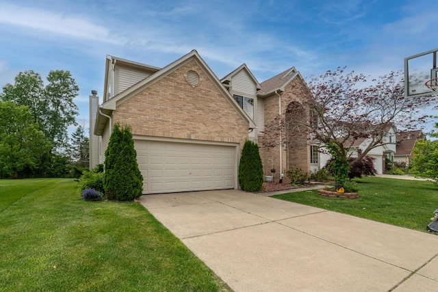 5992 Cedar Ridge Dr, Ann Arbor, MI 48103 - traditional-style house with brick siding, a garage, and a front yard