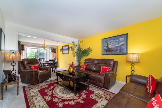 5992 Cedar Ridge Dr, Ann Arbor, MI 48103 - carpeted living room featuring a chandelier