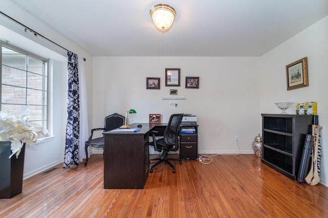 5992 Cedar Ridge Dr, Ann Arbor, MI 48103 - office featuring wood finished floors and baseboards