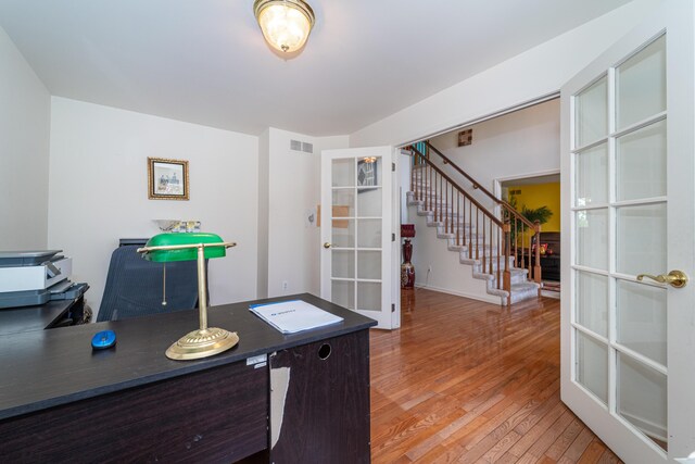 5992 Cedar Ridge Dr, Ann Arbor, MI 48103 - office area featuring french doors and light wood-style floors