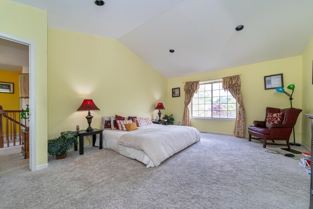 5992 Cedar Ridge Dr, Ann Arbor, MI 48103 - bedroom featuring vaulted ceiling and carpet flooring