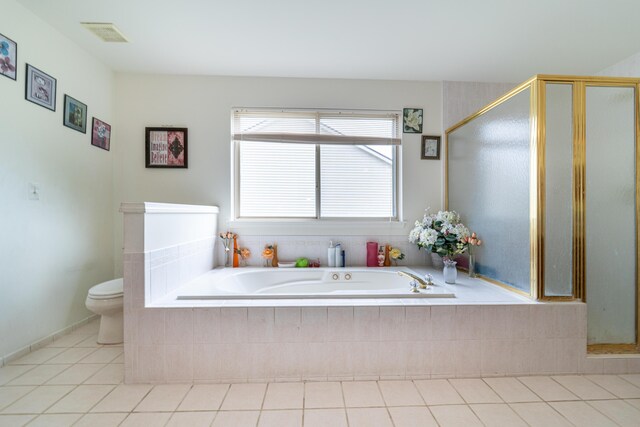 5992 Cedar Ridge Dr, Ann Arbor, MI 48103 - full bathroom featuring tile patterned floors, a bath, and a stall shower