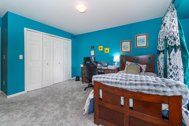 5992 Cedar Ridge Dr, Ann Arbor, MI 48103 - carpeted bedroom with a closet and a desk
