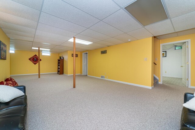 5992 Cedar Ridge Dr, Ann Arbor, MI 48103 - unfurnished living room with stairs, a paneled ceiling, and carpet floors