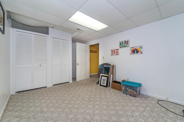 5992 Cedar Ridge Dr, Ann Arbor, MI 48103 - recreation room with carpet flooring and a paneled ceiling