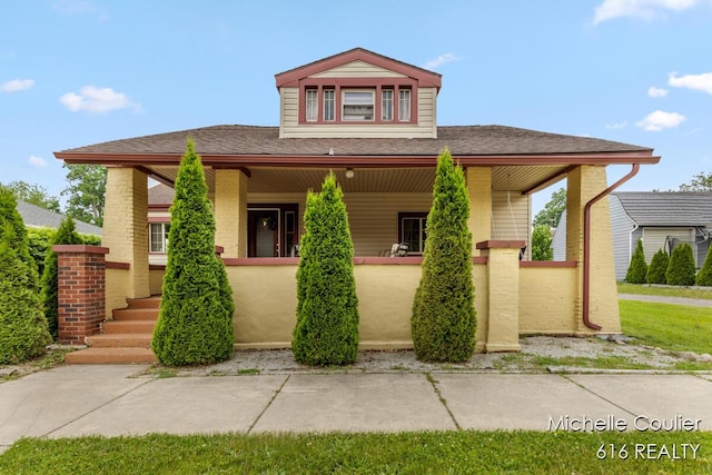626 Academy St, Portland, MI 48875 - view of front of property featuring a porch and a shingled roof