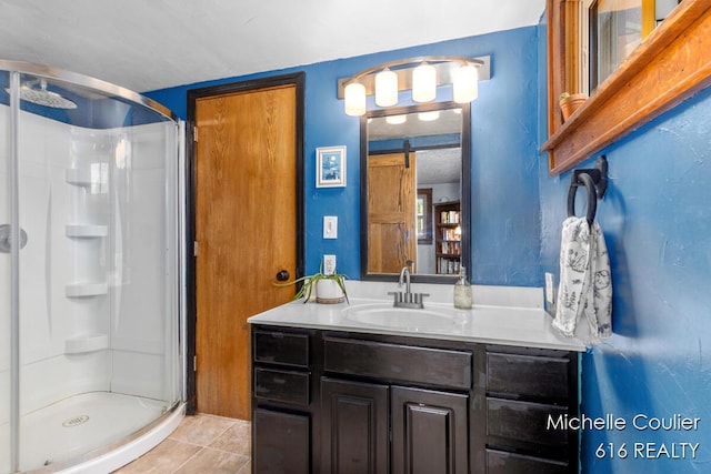 626 Academy St, Portland, MI 48875 - full bath with a stall shower, tile patterned flooring, and vanity
