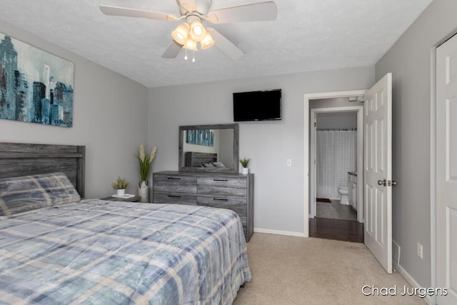 647 Maynard NW, Grand Rapids, MI 49504 - bedroom with carpet flooring, a ceiling fan, and a textured ceiling
