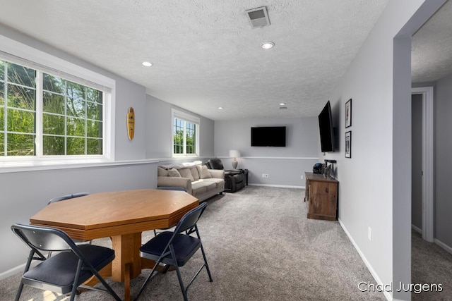 647 Maynard NW, Grand Rapids, MI 49504 - carpeted dining room with a textured ceiling and recessed lighting