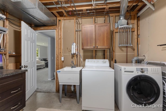 647 Maynard NW, Grand Rapids, MI 49504 - laundry area featuring washer and dryer and cabinet space