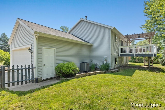 647 Maynard NW, Grand Rapids, MI 49504 - view of side of home with a garage, a deck, stairway, and a pergola
