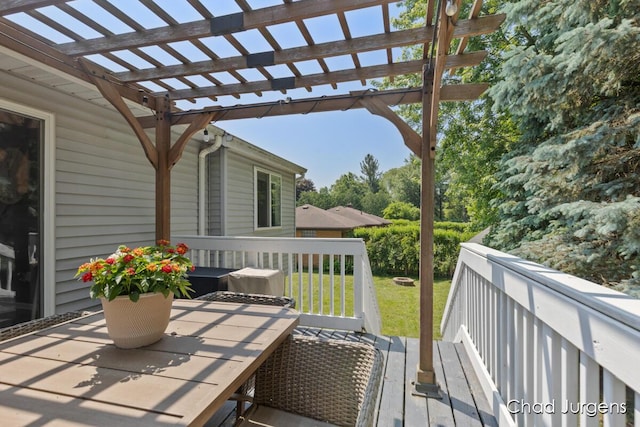 647 Maynard NW, Grand Rapids, MI 49504 - deck with a lawn, a pergola, and outdoor dining area