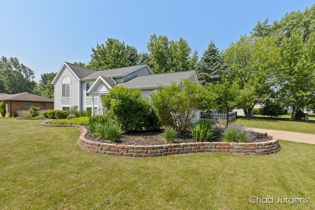 647 Maynard NW, Grand Rapids, MI 49504 - view of front of home featuring a front yard