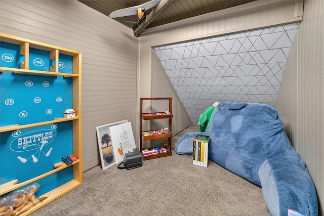2975 Pine Edge Ct, Holland, MI 49424 - recreation room with carpet and wood walls