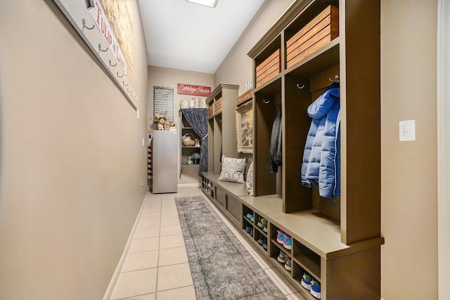 2975 Pine Edge Ct, Holland, MI 49424 - mudroom featuring light tile patterned floors and baseboards