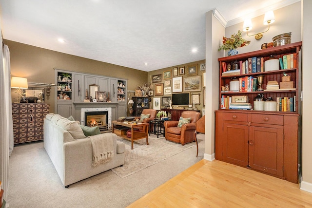 2975 Pine Edge Ct, Holland, MI 49424 - living area featuring a high end fireplace, light wood finished floors, and recessed lighting