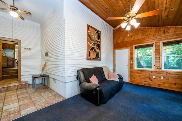 620 Vann St, Niles, MI 49120 - living area with ceiling fan, wood walls, lofted ceiling, wood ceiling, and light carpet