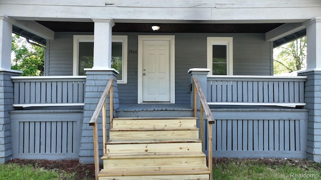 1906 N Charles St, Saginaw, MI 48602 - property entrance featuring covered porch