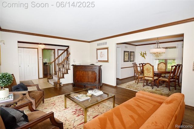 36780 Chesapeake Rd, Farmington Hills, MI 48335 - living room with a chandelier, wood finished floors, and ornamental molding