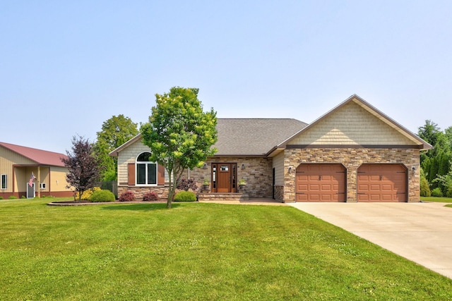 10317 Lange Rd, Birch Run, MI 48415 - view of front of home featuring stone siding, an attached garage, a front lawn, and driveway