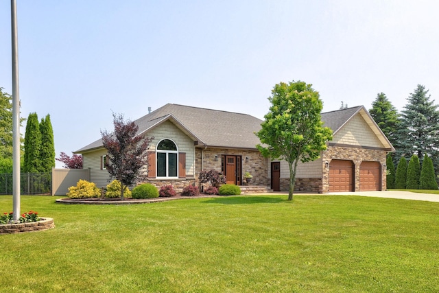 10317 Lange Rd, Birch Run, MI 48415 - view of front facade featuring stone siding, driveway, and an attached garage
