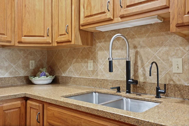 10317 Lange Rd, Birch Run, MI 48415 - kitchen with decorative backsplash and light stone countertops