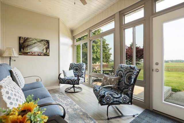 10317 Lange Rd, Birch Run, MI 48415 - sunroom / solarium featuring wood finished floors and vaulted ceiling