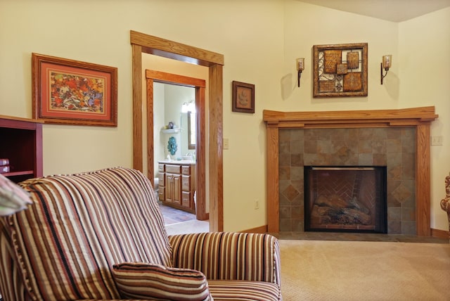10317 Lange Rd, Birch Run, MI 48415 - living area featuring carpet floors and a tiled fireplace