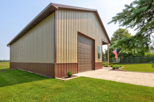 10317 Lange Rd, Birch Run, MI 48415 - view of property exterior with an outbuilding, a detached garage, and driveway