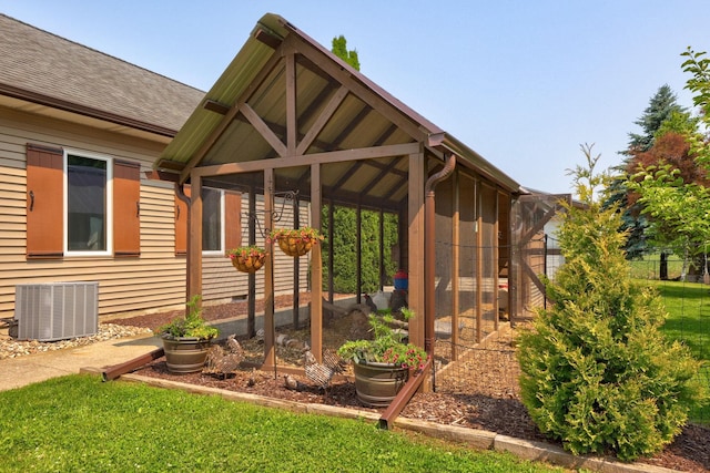 10317 Lange Rd, Birch Run, MI 48415 - view of property exterior with a shingled roof and exterior structure