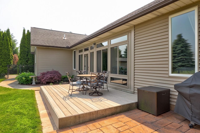 10317 Lange Rd, Birch Run, MI 48415 - wooden terrace featuring outdoor dining space and grilling area