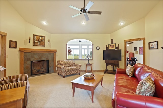 10317 Lange Rd, Birch Run, MI 48415 - living room with vaulted ceiling, ceiling fan, light colored carpet, a tiled fireplace, and recessed lighting