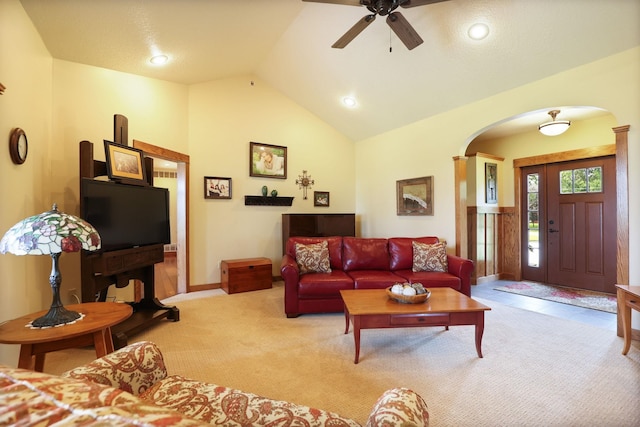 10317 Lange Rd, Birch Run, MI 48415 - living area featuring arched walkways, lofted ceiling, a ceiling fan, light colored carpet, and recessed lighting