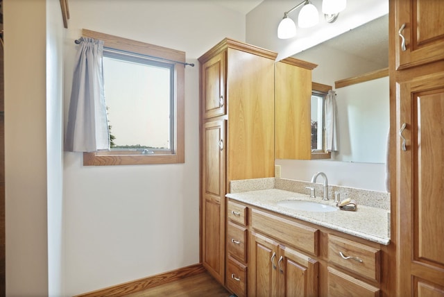 10317 Lange Rd, Birch Run, MI 48415 - bathroom featuring vanity and wood finished floors