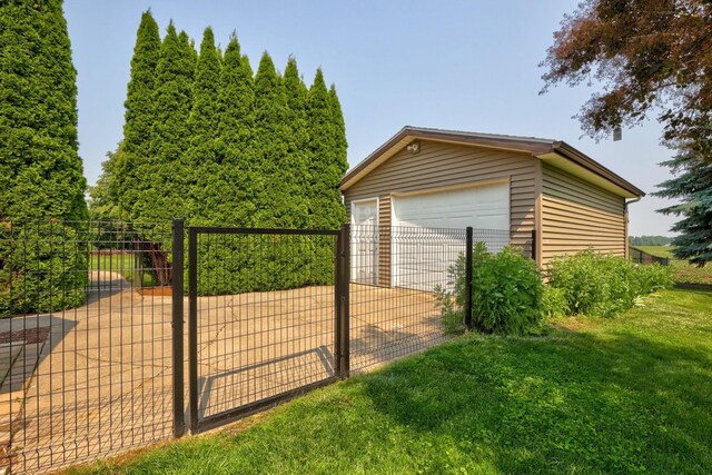 10317 Lange Rd, Birch Run, MI 48415 - detached garage featuring a gate