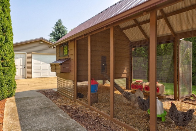 10317 Lange Rd, Birch Run, MI 48415 - view of patio / terrace featuring an outbuilding and exterior structure