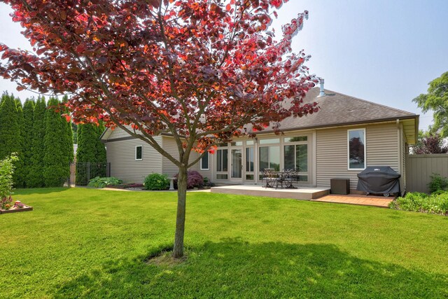 10317 Lange Rd, Birch Run, MI 48415 - rear view of house with a shingled roof