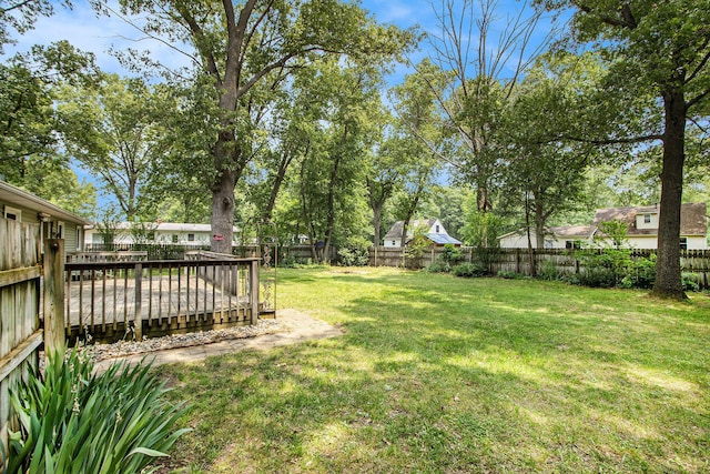 51591 Oak Dr, Mattawan, MI 49071 - fenced backyard featuring a wooden deck