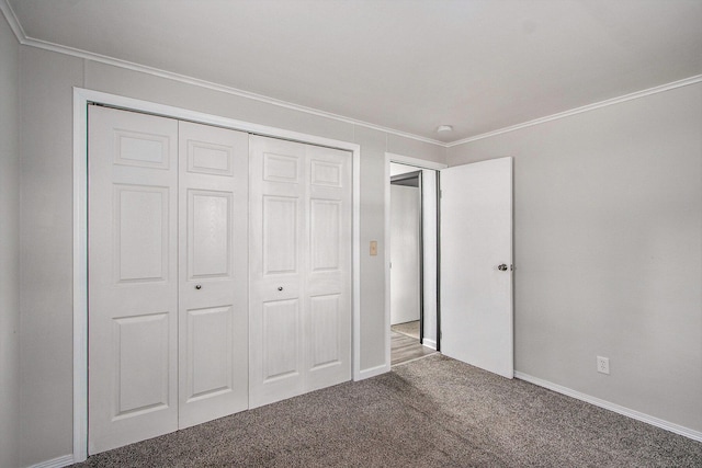 51591 Oak Dr, Mattawan, MI 49071 - unfurnished bedroom with ornamental molding, carpet, and a closet