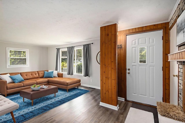 51591 Oak Dr, Mattawan, MI 49071 - living room with healthy amount of natural light, wood finished floors, ornamental molding, and wood walls