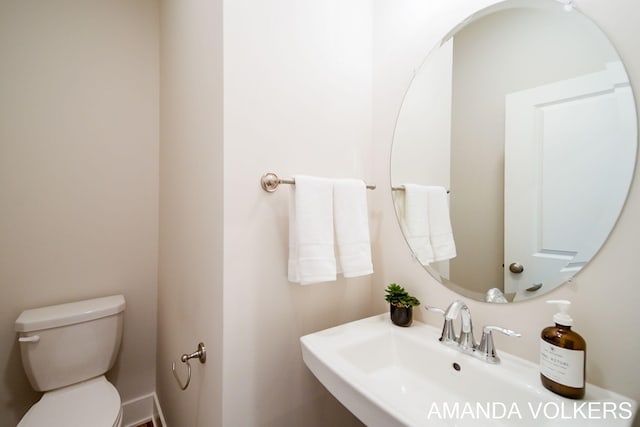1753 Portadown Rd, Byron Center, MI 49315 - bathroom featuring a sink and toilet