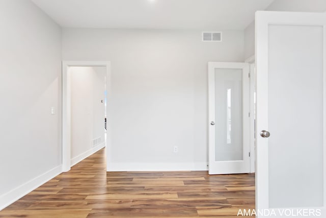 1753 Portadown Rd, Byron Center, MI 49315 - unfurnished room featuring wood finished floors and baseboards
