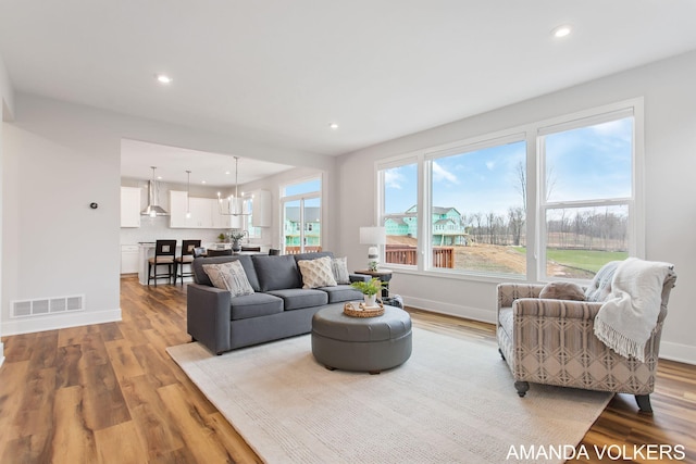 1753 Portadown Rd, Byron Center, MI 49315 - living area featuring wood finished floors and recessed lighting