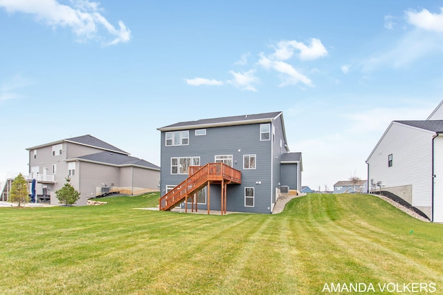 1753 Portadown Rd, Byron Center, MI 49315 - back of property featuring stairway, a deck, and a yard