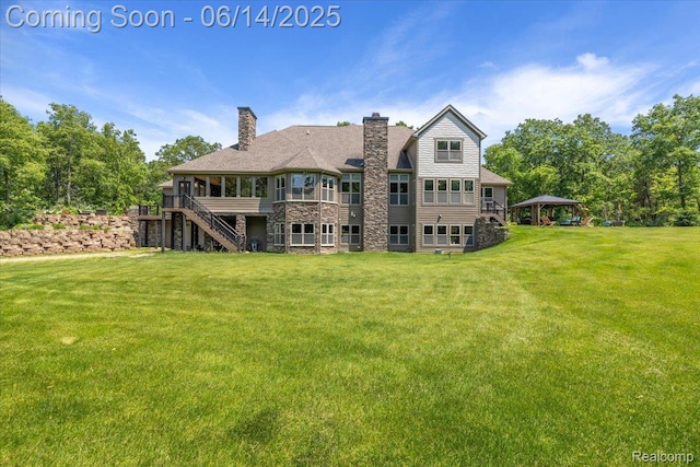 5432 Blood Rd, Metamora, MI 48455 - rear view of property with a yard, a chimney, stairway, and a gazebo