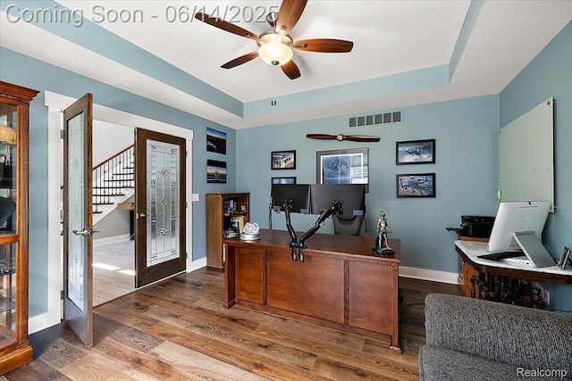 5432 Blood Rd, Metamora, MI 48455 - office space featuring a ceiling fan, wood finished floors, and a raised ceiling